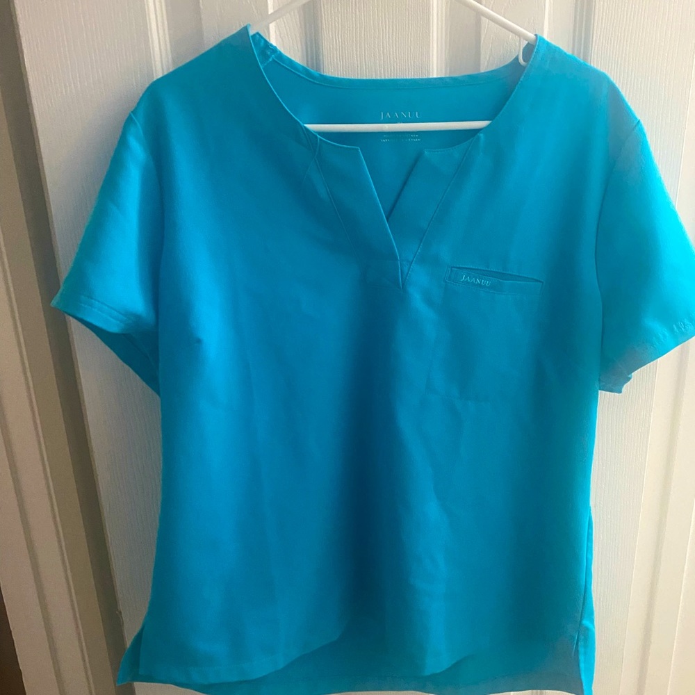 Jaanuu 1 pocket women’s tuck in top in teal XL